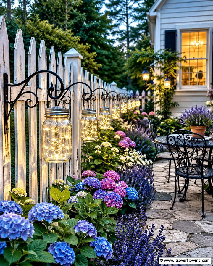 Hanging Mason Jar Lights - 25 Fence Lighting Ideas to Illuminate Your Outdoor Space