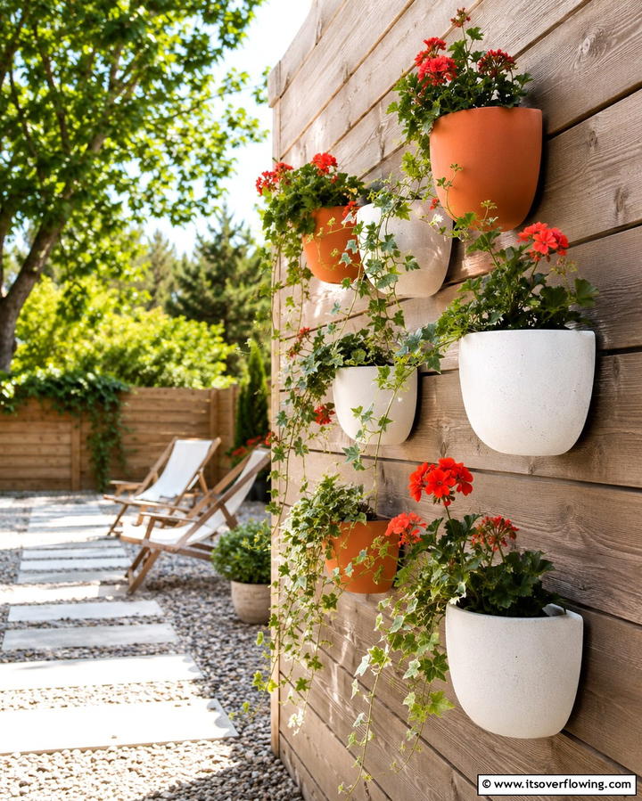 Hanging Plant Holders - 25 Fence Art Ideas to Add Personality to Your Yard