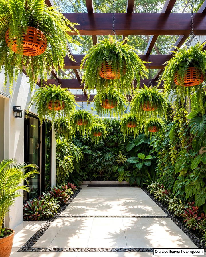 Hanging Planters with Ferns - 25 Tropical Garden Ideas for a Lush Outdoor Oasis