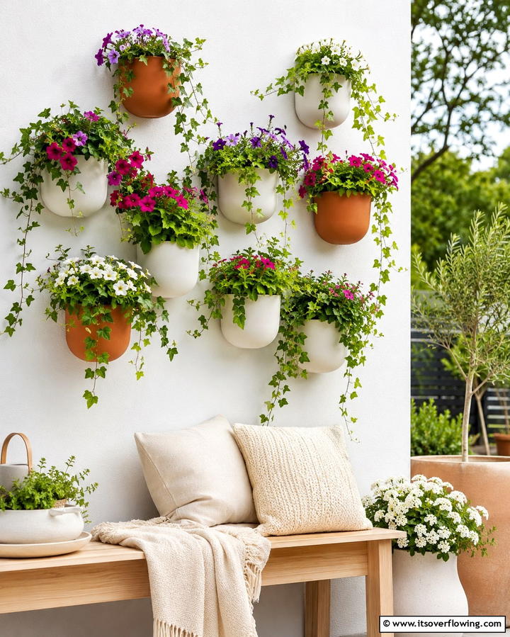Hanging Wall Planters - 25 Patio Wall Ideas to Transform Your Outdoor Space