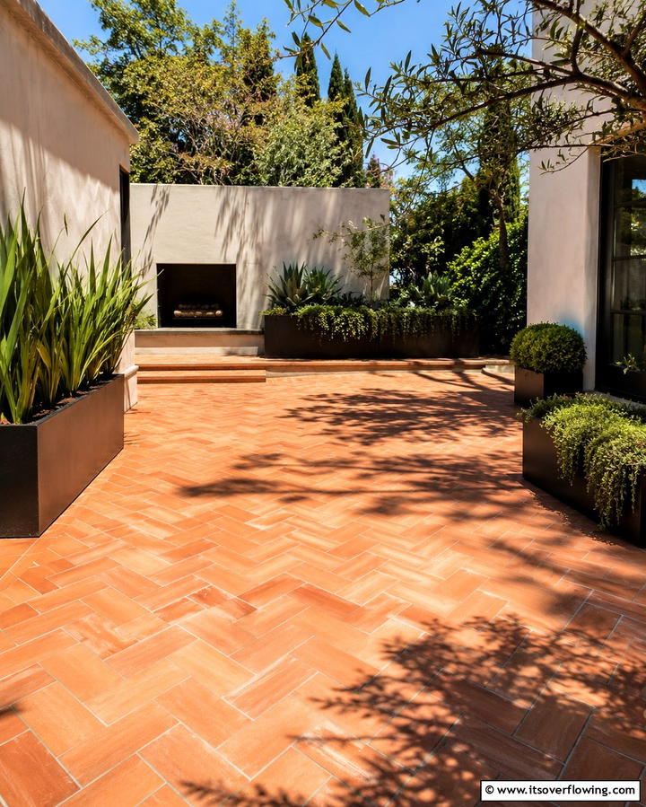 Herringbone with Grass Inlays - 25 Herringbone Brick Patio Designs for a Classic Look