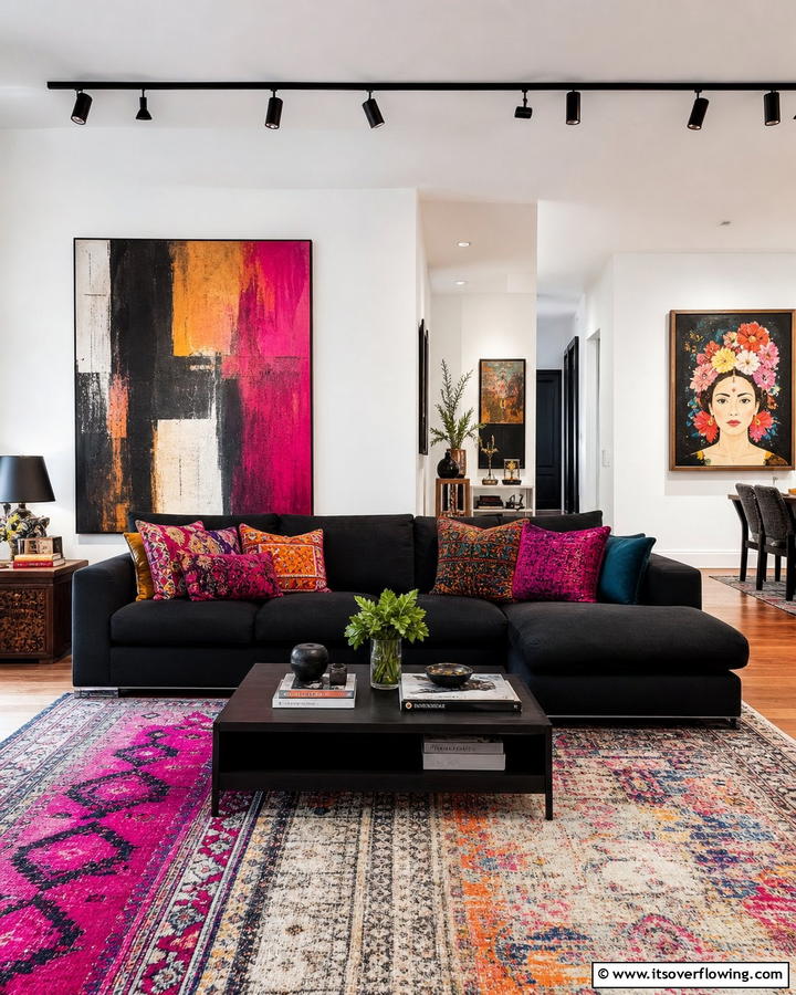 High Contrast Black Couch with Vibrant Decor - 21 Chic Black Couch Living Room Styling Inspirations