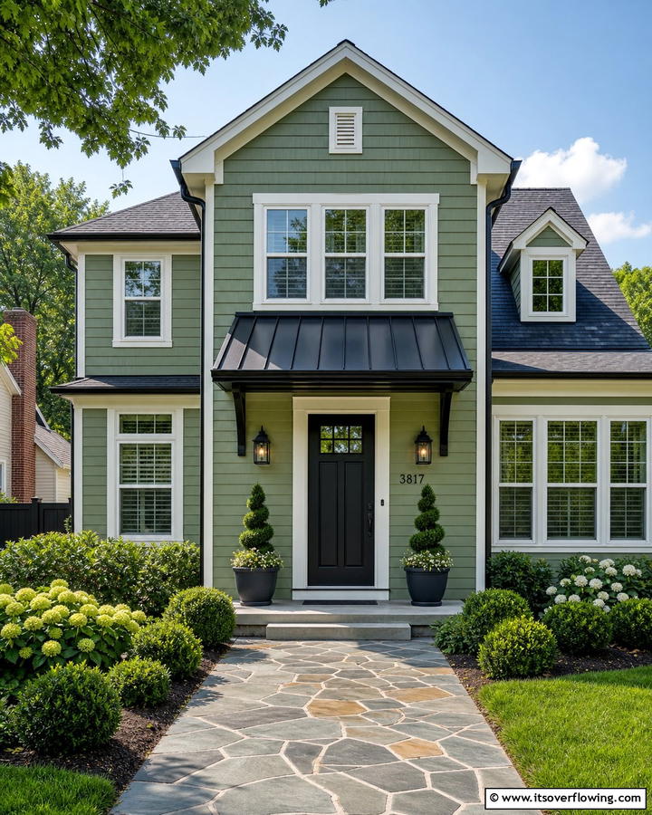 Highlighting the Door with a Black Awning - 20 Sage Green House With Black Door Design Ideas