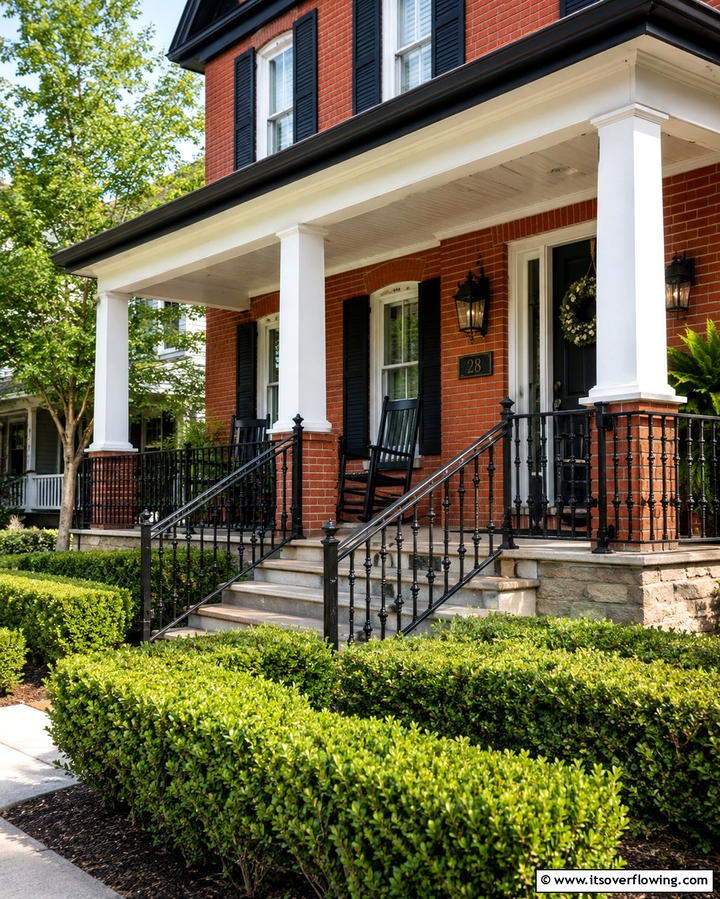 Incorporate Black Railings for Porches - 25 Red Brick House with Black Trim Design Ideas