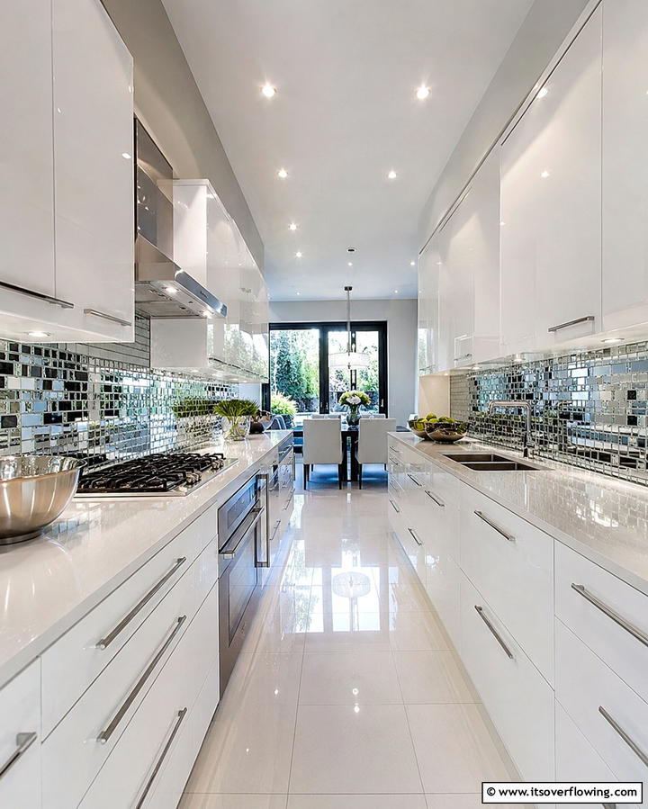 Incorporate Mirrors or Reflective Surfaces - 25 Small Galley Kitchen Ideas on a Budget
