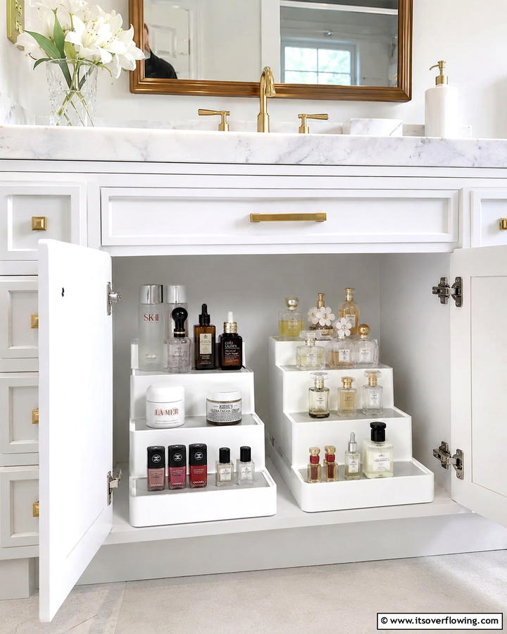 Incorporate Tiered Organizers - 25 Bathroom Cabinet Organization Ideas for a Clutter-Free Space