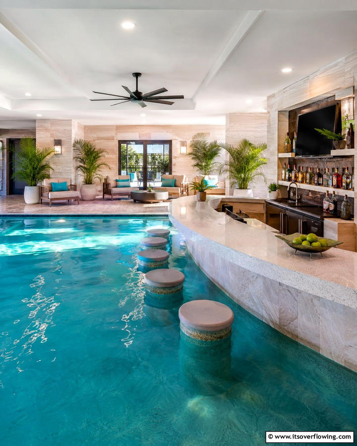 Indoor Pool with a Swim Up Bar - 25 Luxurious Indoor Pool Ideas for Year-Round Relaxation