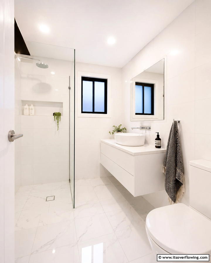 Install a Wall Mounted Vanity - 30 Small White Bathroom Ideas to Brighten Compact Spaces