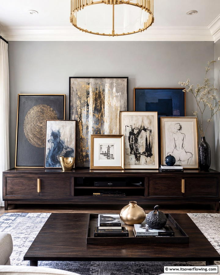 Layered Artwork - 25 TV Console Decor Ideas to Elevate Your Living Room