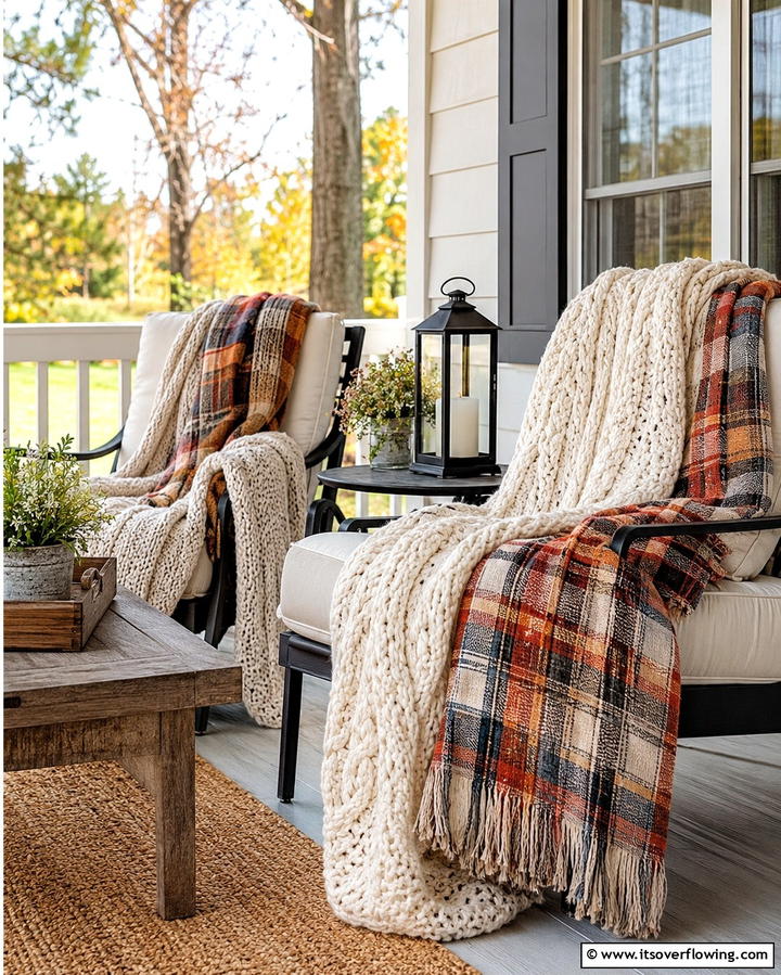 Layered Blankets and Throws - 25 Farmhouse Porch Ideas for a Cozy Outdoor Retreat
