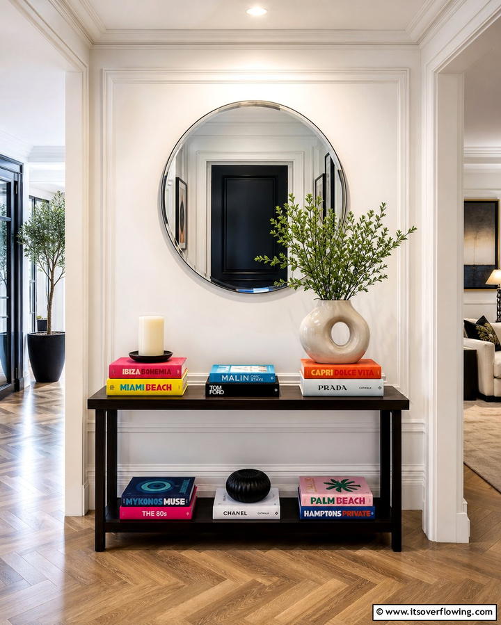 Layered Books for a Sophisticated Look - 25 Entryway Table Decor Ideas to Welcome Guests in Style