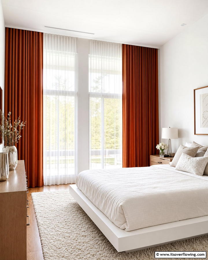 Layered Rust Curtains - 20 Rust Bedroom Ideas for a Cozy and Inviting Space