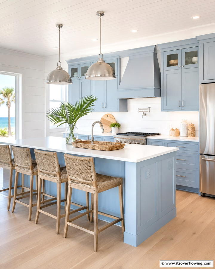 Light Blue Cabinets for a Breezy Coastal Feel - 25 Painting Kitchen Cabinet Ideas for a Fresh Look