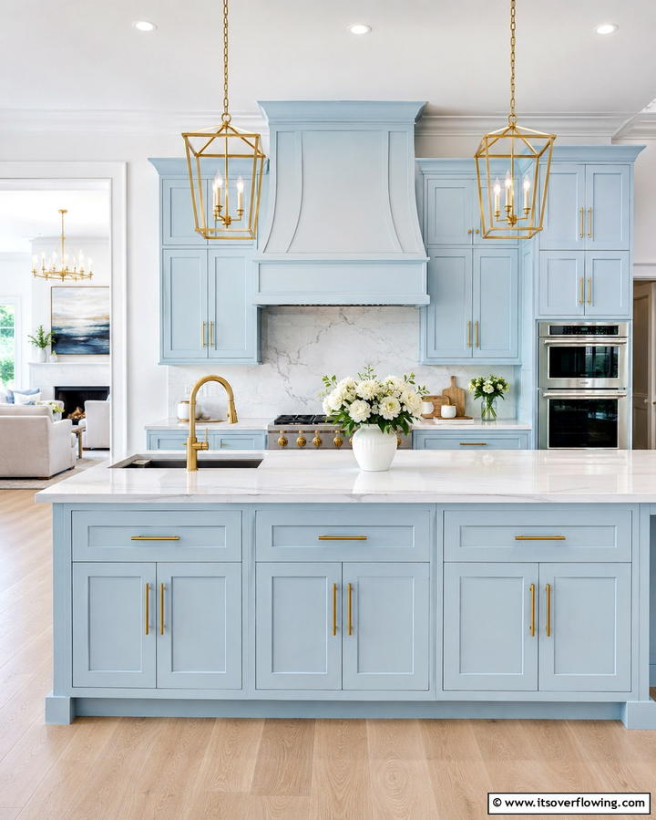 Light Blue Cabinets with Gold AccentsOne - 25 Light Blue Kitchen Cabinets Ideas for a Coastal Vibe