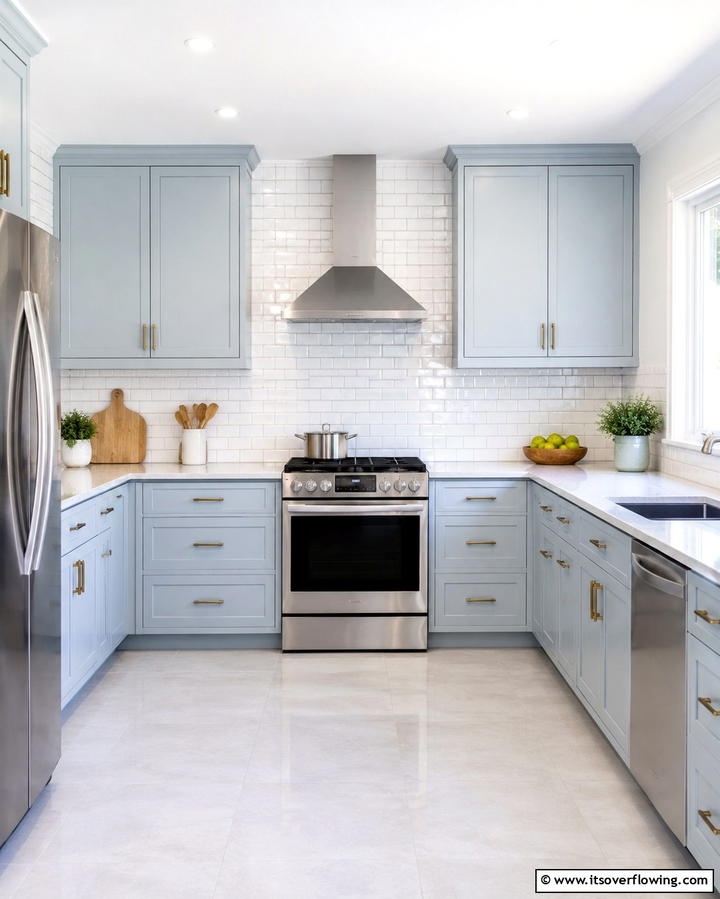 Light Blue Cabinets with Subway Tile Backsplash - 25 Light Blue Kitchen Cabinets Ideas for a Coastal Vibe