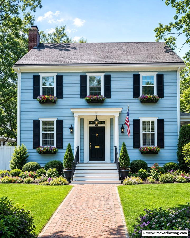Light Blue with Black Shutters - 25 Blue House With Black Trim Ideas for a Striking Exterior