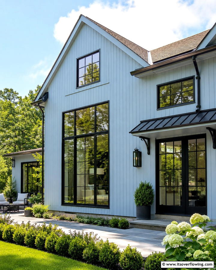 Light Blue with Black Window Frames - 25 Light Blue House Exterior Ideas for a Fresh Look