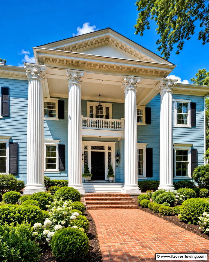 Light Blue with Decorative White Columns - 25 Light Blue House Exterior Ideas for a Fresh Look