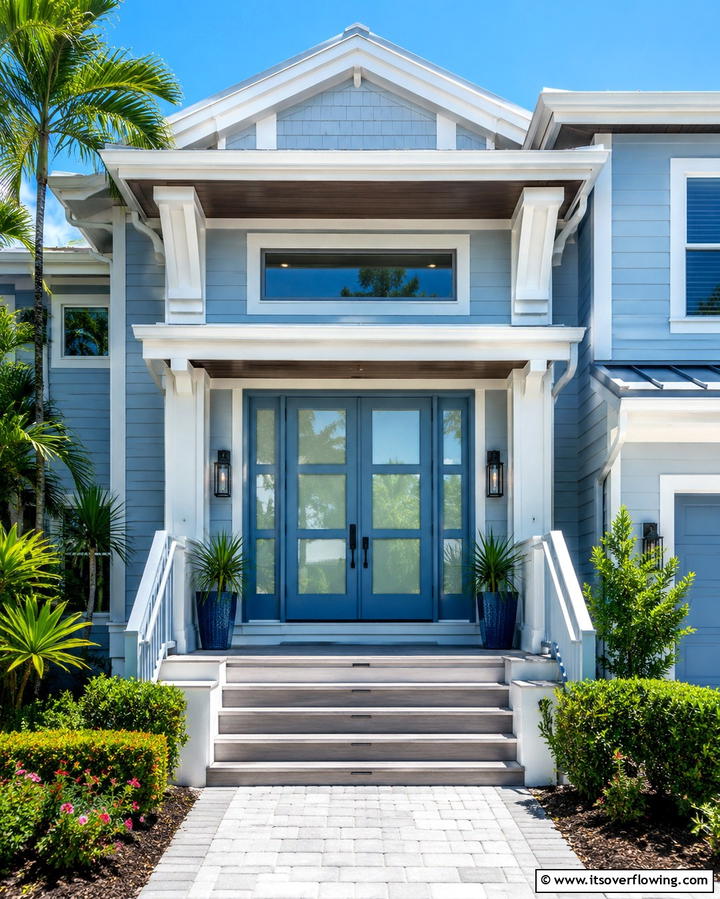 Light Blue with Glass Paneled Doors - 25 Light Blue House Exterior Ideas for a Fresh Look