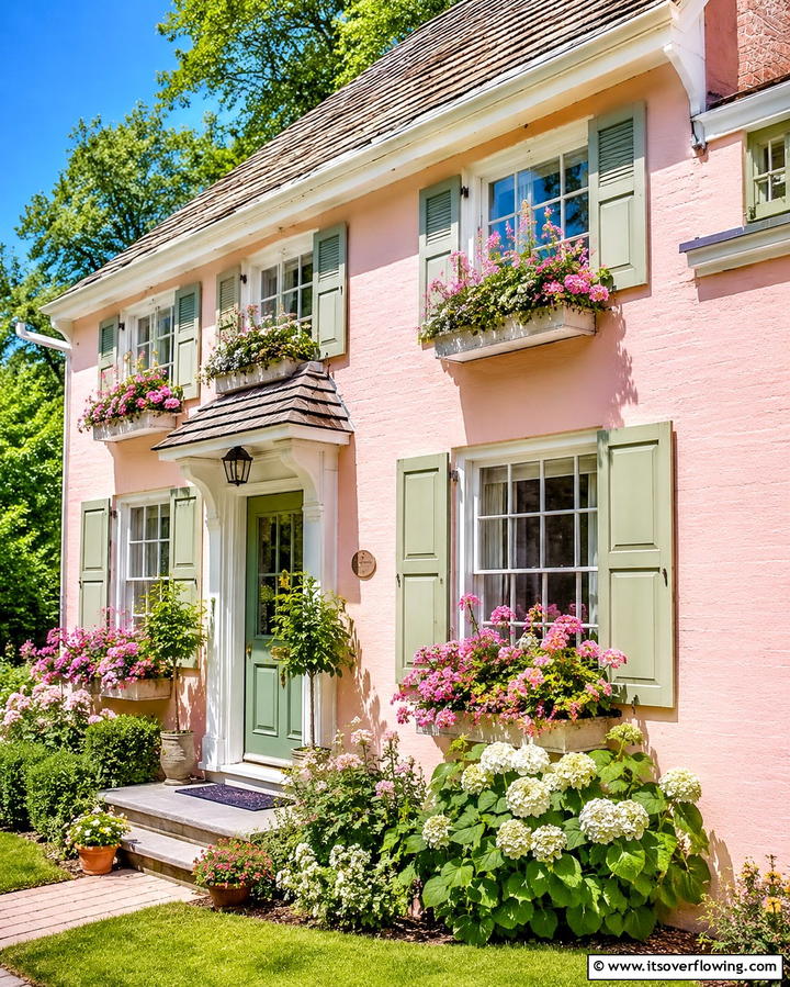 Light Pink with Green Shutters - 25 Pink House Exterior Ideas for a Charming Look