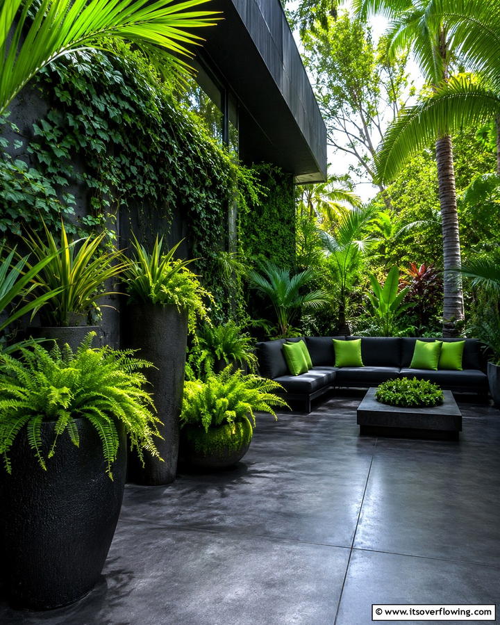 Lush Green Accents - 25 Black Concrete Patio Ideas for Modern Outdoor Spaces