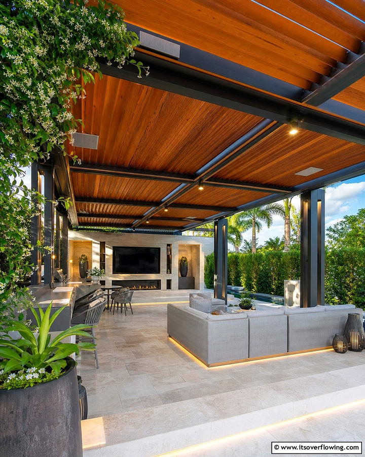 Luxurious Pergola with Entertainment Area - 21 Pergola Patio Designs for Structured Outdoor Shade Solutions