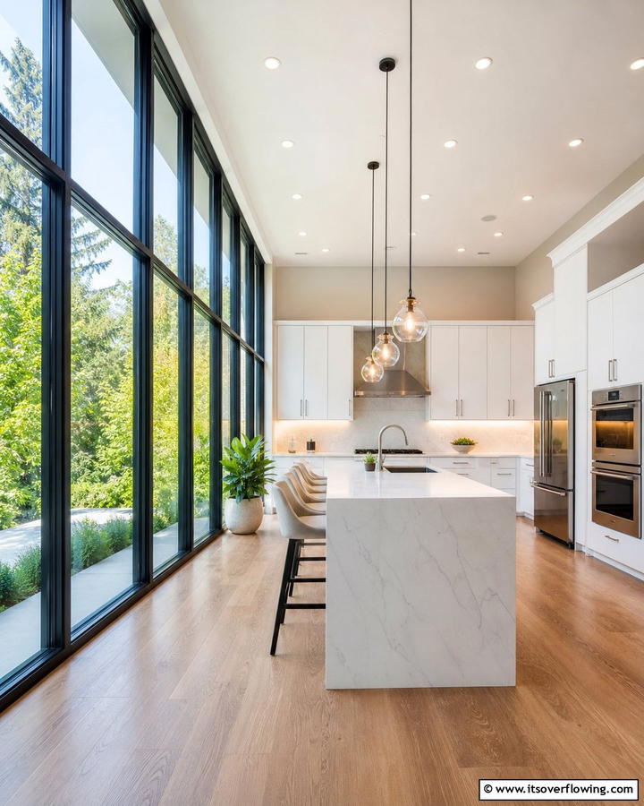 Maximizing Sunlight with Floor to Ceiling Windows - 21 Kitchen Window Ideas to Brighten Your Cooking Space