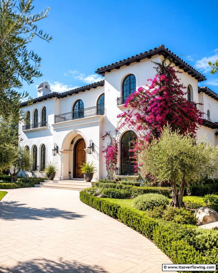 Mediterranean Revival Refresh - 25 White Exterior Home with a Black Roof Ideas