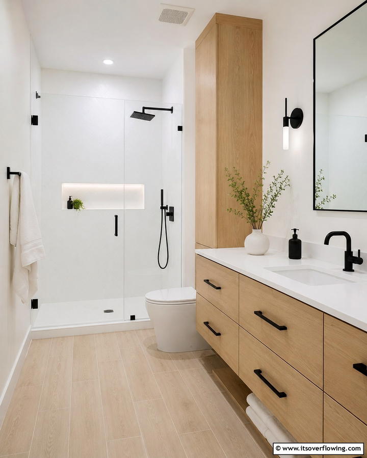 Minimalist Black Fixtures - 25 Scandinavian Bathroom Ideas for a Minimalist and Cozy Space