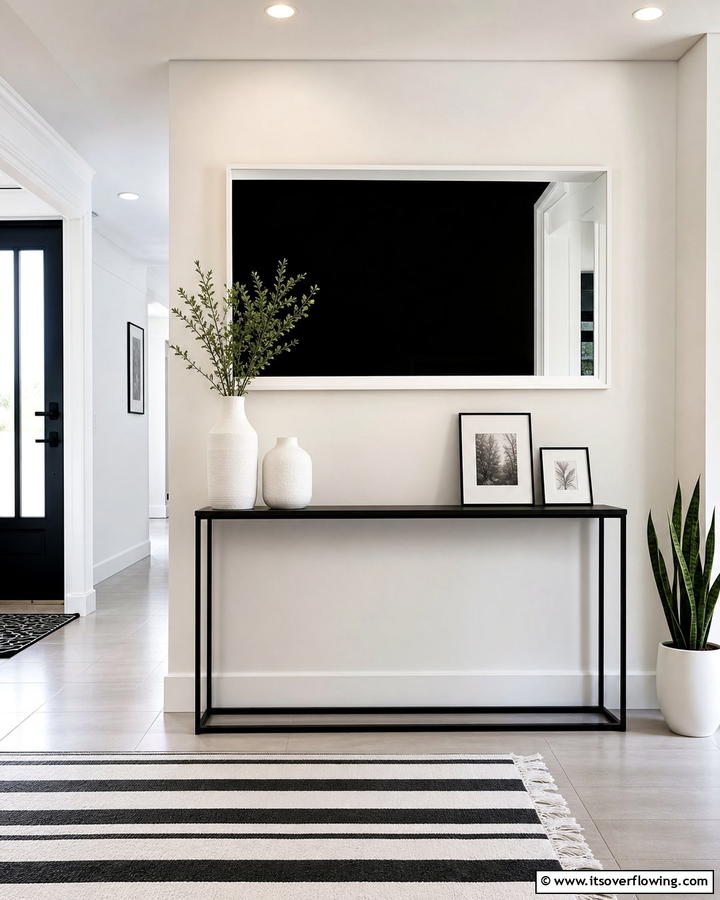 Minimalist Black Mirror with White Frame - 20 Black and White Entryway Design Ideas for a Chic Look