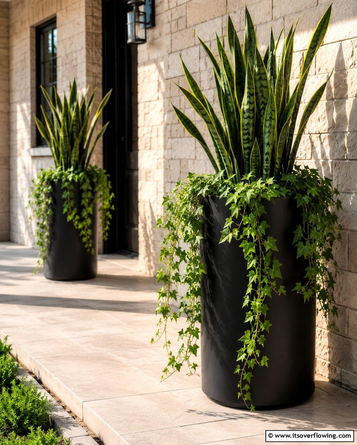Minimalist Black Planters - 30 Inviting Black Porch Ideas for a Modern Outdoor Oasis