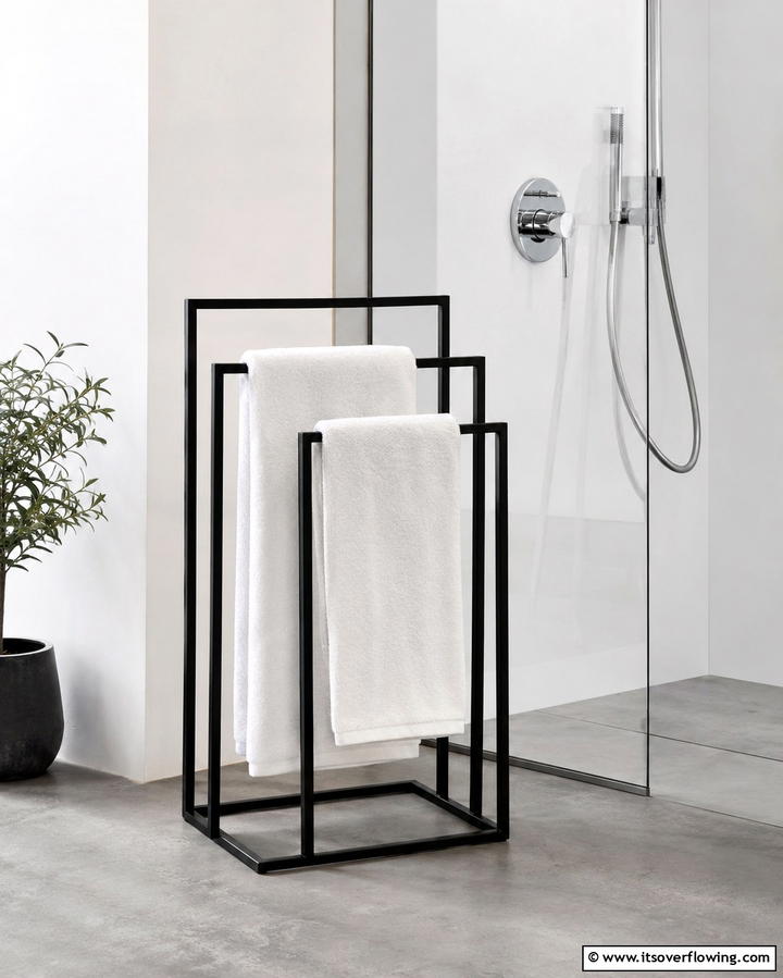 Minimalist Freestanding Towel Rack - 30 Functional Bathroom Furniture Ideas to Maximize Space