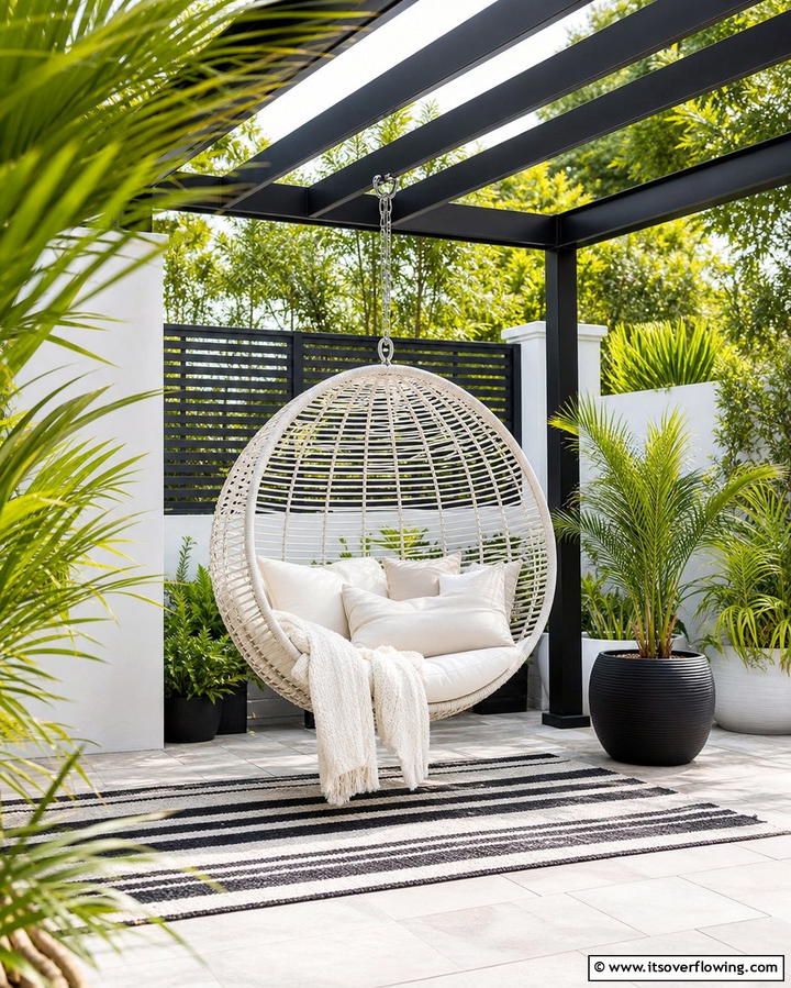 Minimalist Hanging Chairs - 25 Black and White Patio Ideas for a Timeless Look