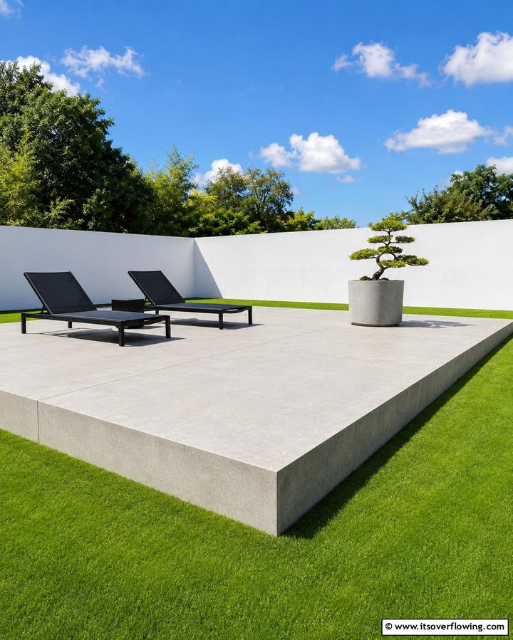 Minimalist Raised Patio with Clean Lines - 25 Raised Concrete Patio Ideas for a Modern Outdoor Space