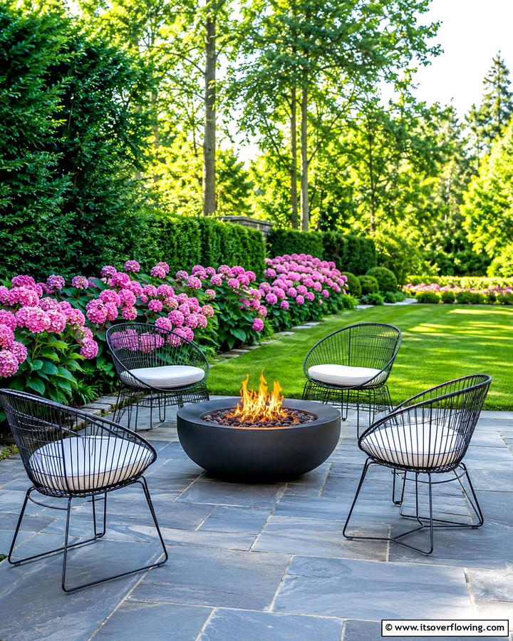 Minimalist Steel Firepit Bowl - 25 Patio Ideas With Firepit for Cozy Gatherings