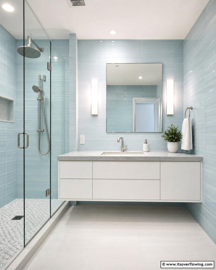 Minimalistic Pastel Blue for Subtle Elegance - 25 Stunning Blue Tile Bathroom Ideas for a Fresh Look
