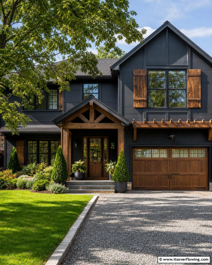 Modern Black Siding with Wood Accents - 25 Black Siding House Ideas for a Bold and Modern Look