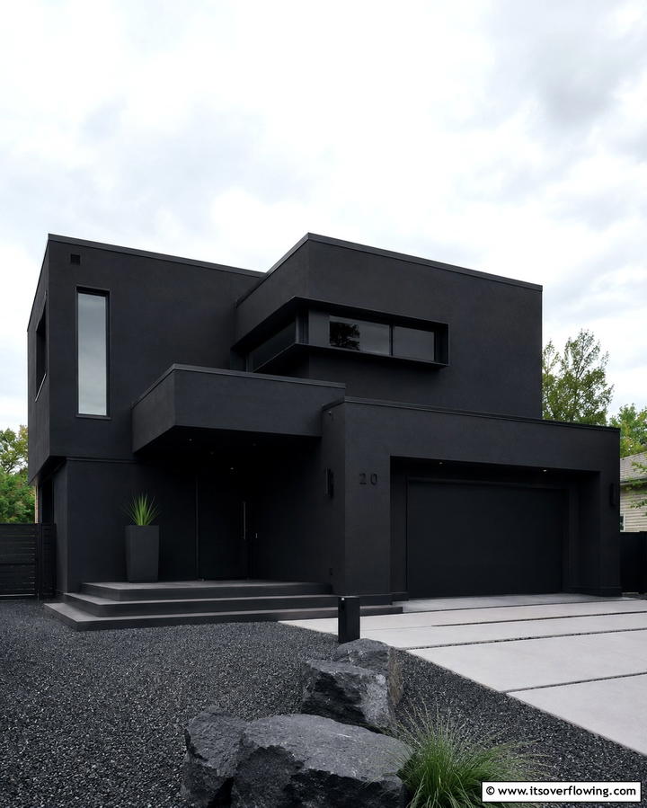 Monochromatic Black Stucco Exterior - 25 Black Stucco House Ideas for Modern Exteriors