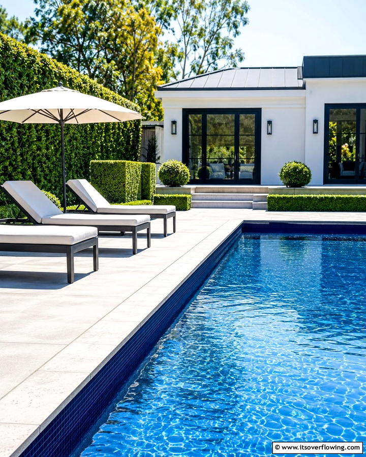 Monochromatic Tiles - 20 Waterline Pool Tile Ideas for a Stunning Backyard Oasis