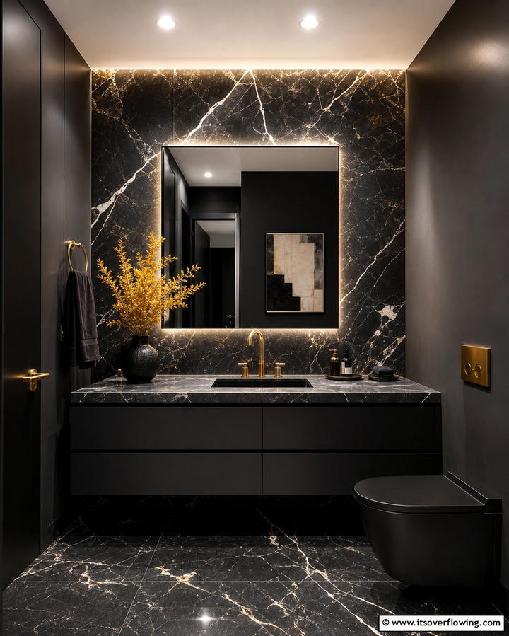 Moody Marble Accents - 25 Elegant Black Powder Room Ideas for a Bold Look