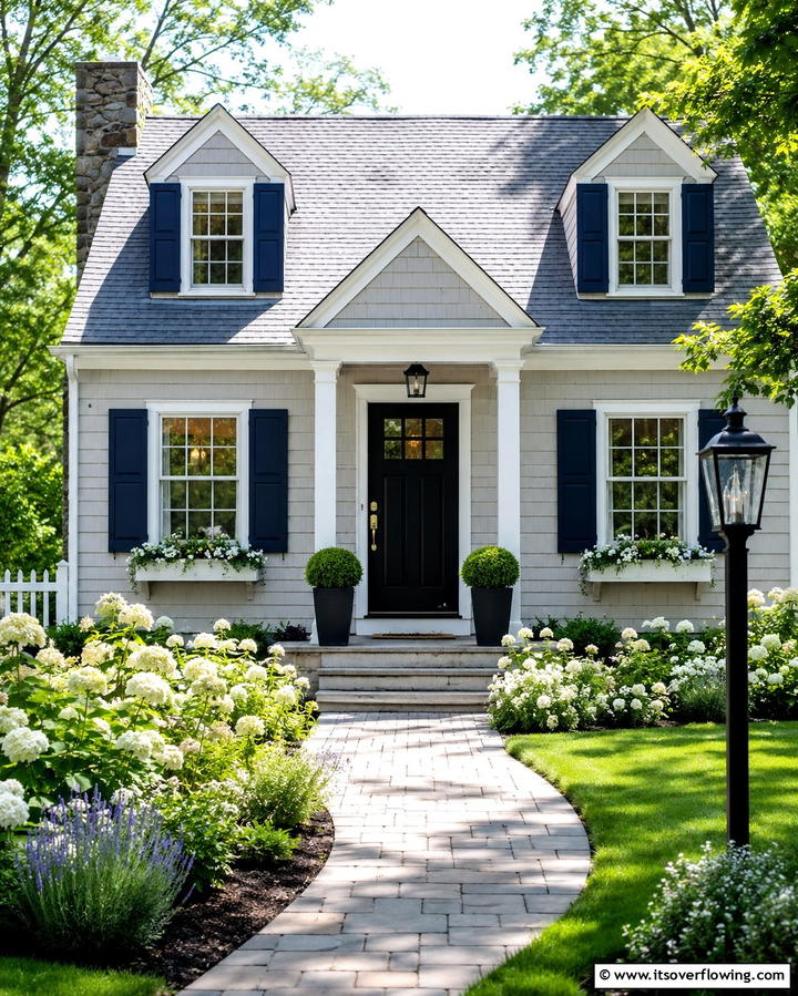Neutral Color Palette with Contrasting Accents - 25 Modern Cottage House Exterior Ideas for a Charming Look