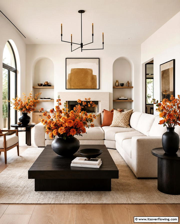Orange Floral Arrangements with Black Vases - 25 Black and Orange Living Room Ideas for a Bold Statement
