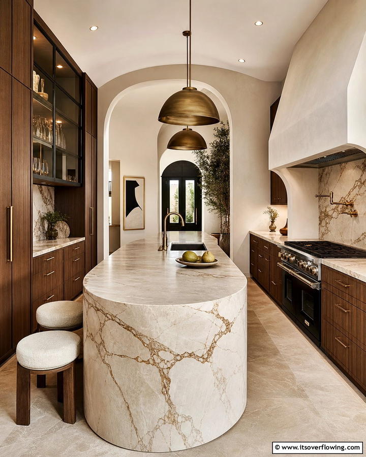 Oval Shaped Marble Island - 25 Marble Kitchen Island Ideas for a Stunning Centerpiece