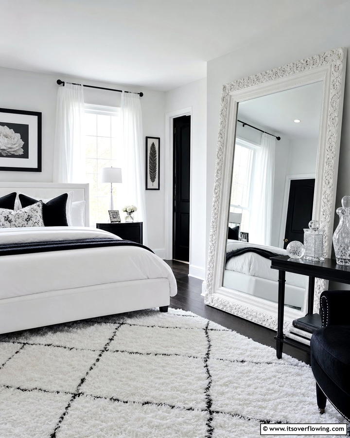 Oversized Black Mirror with White Frame - 20 Feminine Black and White Bedroom Ideas for Elegance