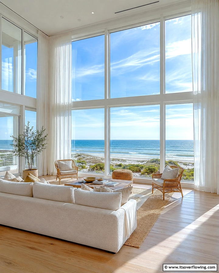 Oversized Windows - 25 Beach House Living Room Ideas for a Coastal Vibe