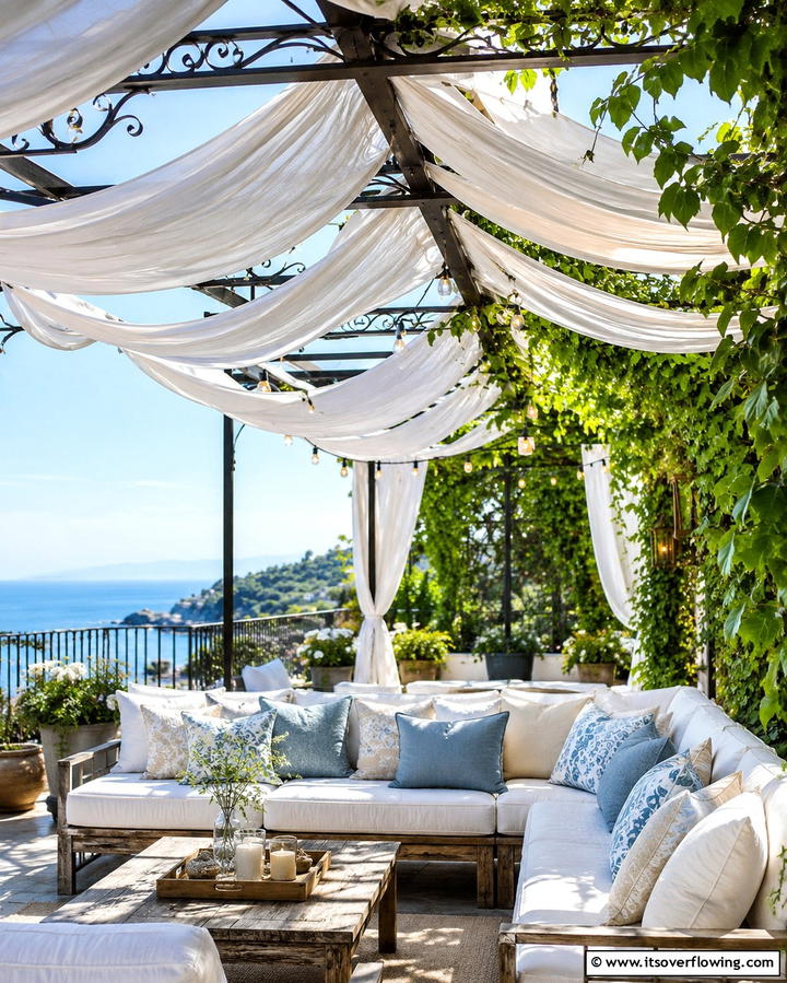Pergola with Draped Fabrics - 25 Mediterranean Patio Ideas for Outdoor Living Spaces