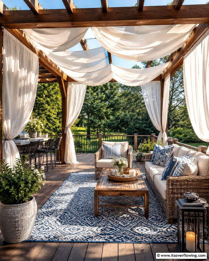 Pergola with Drapes for a Breezy Retreat - 25 Covered Deck Ideas for Year-Round Outdoor Living