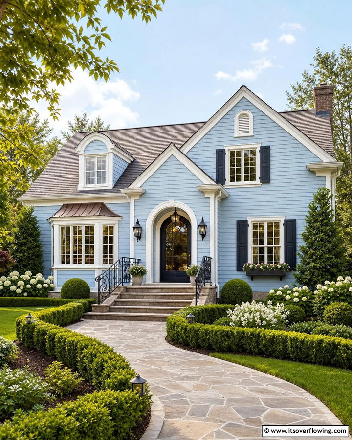 Powder Blue and Brown Roof for a Soft and Elegant Look - 25 Stunning Blue Exterior Home with Brown Roof Ideas