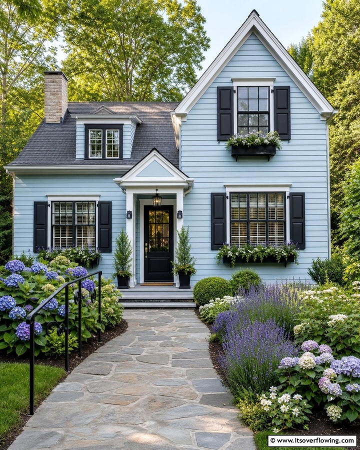 Powder Blue with Matte Black Shutters - 25 Blue House With Black Trim Ideas for a Striking Exterior