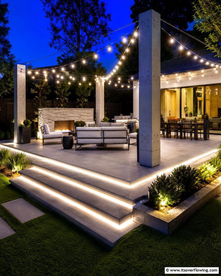 Raised Patio with Outdoor Lighting Features - 25 Raised Concrete Patio Ideas for a Modern Outdoor Space
